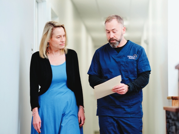 Tobias and patient walking
