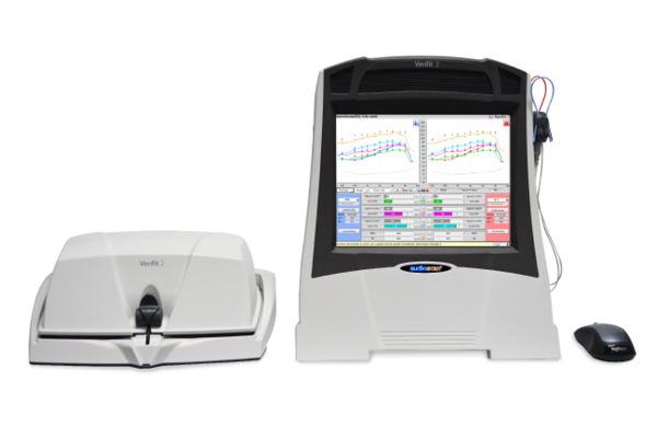 Real-ear measurement device displaying hearing aid calibration graphs for precise in-ear sound verification.
